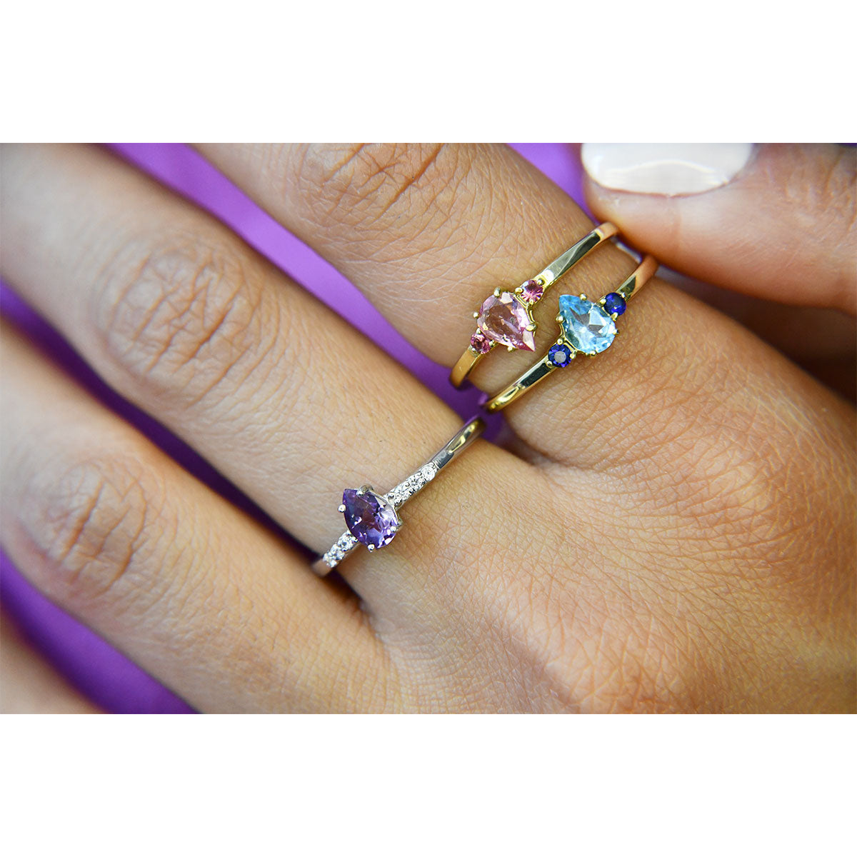 Anillo con Topacio Azul y Zafiros