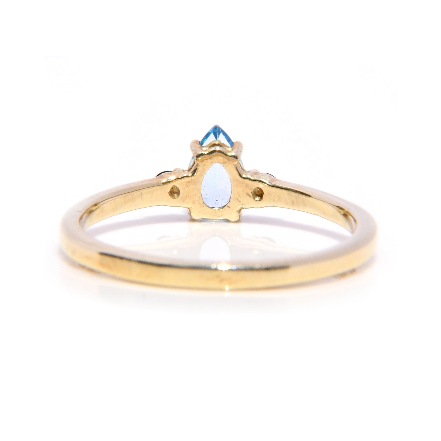 Anillo con Topacio Azul y Zafiros