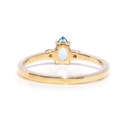 Anillo con Topacio Azul y Zafiros